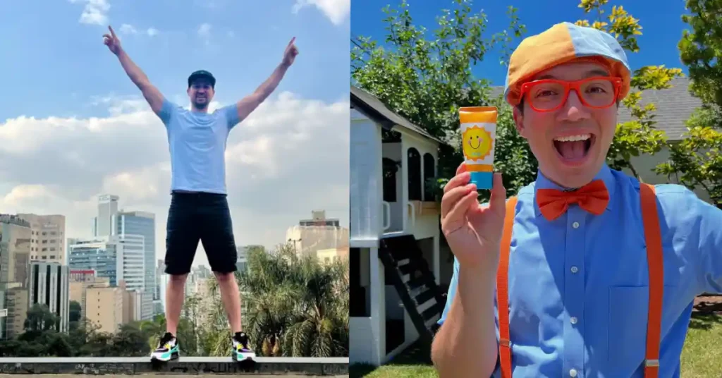Side-by-side images of the man behind Blippi. On the left, he is casually dressed in a light blue T-shirt, black shorts, and a cap, standing on a city rooftop with both arms raised in excitement. On the right, he is dressed in the colorful Blippi outfit—blue shirt, orange suspenders, orange bow tie, and hat—smiling brightly and holding a cheerful, sun-themed tube of sunscreen in a sunny backyard setting.